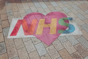 Things To Do On Arrival 3 NHS heart 300x200